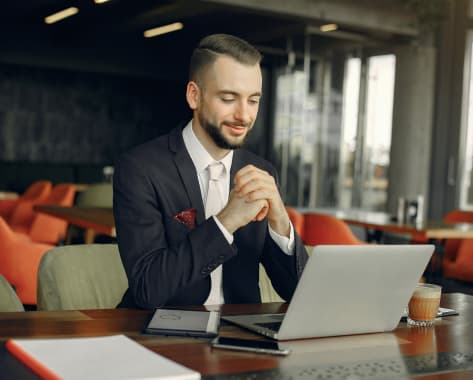 stylish-businessman-working-cafe